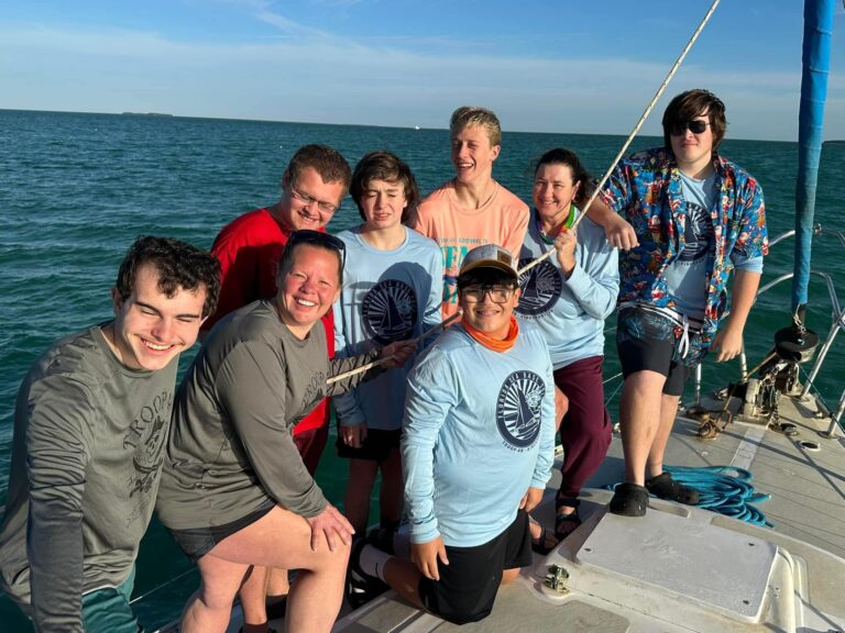 Scouts on the deck of a sailboat at Sea Base