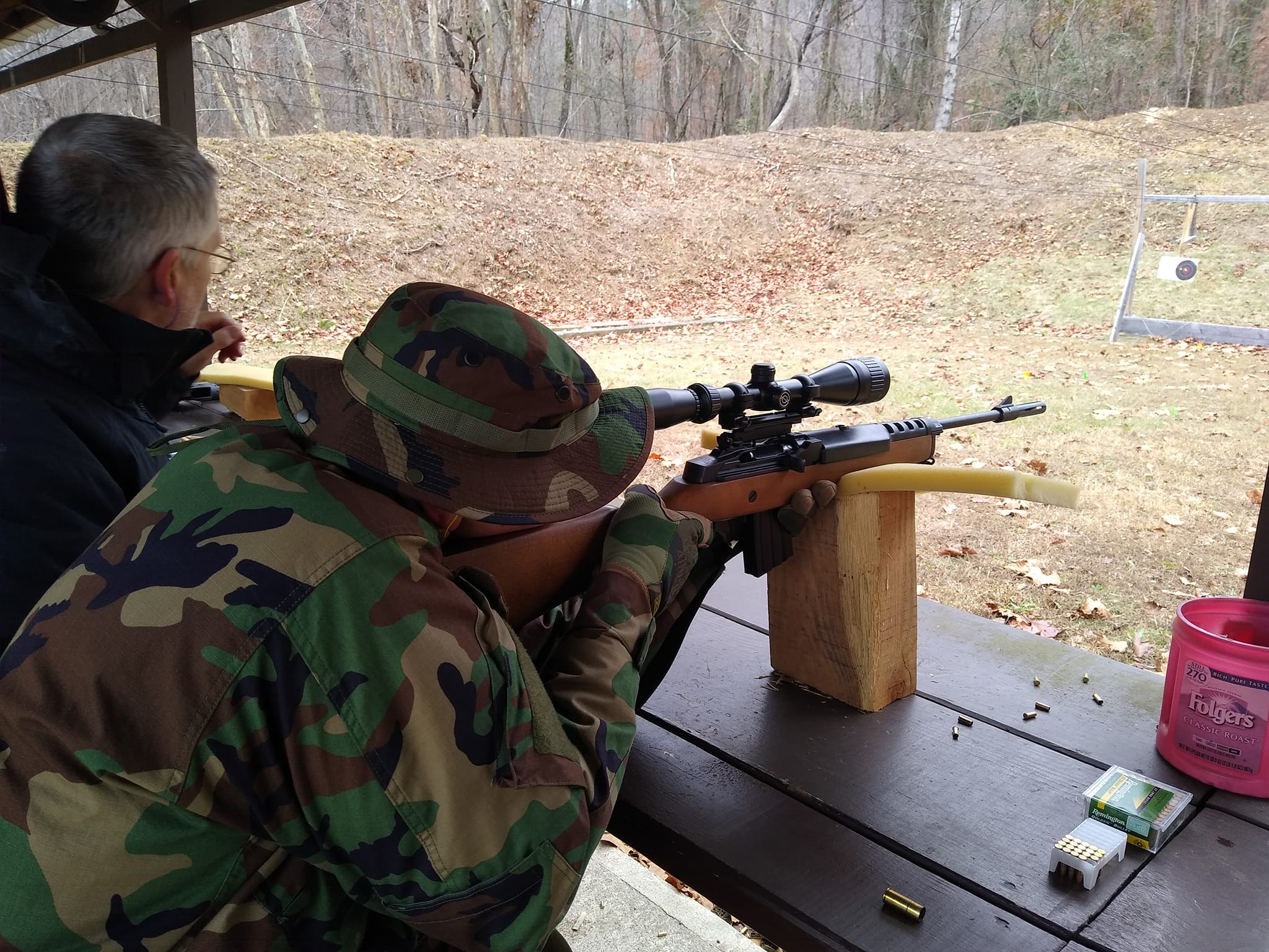 A scout testing firearm safety